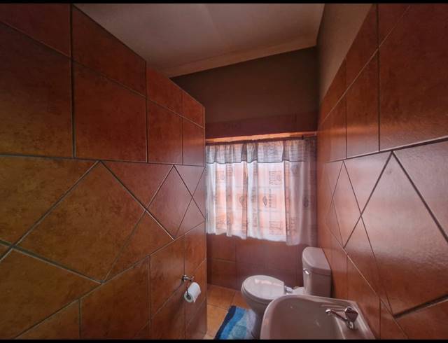 7 BEDROOM GUEST HOUSE FOR SALE IN DIBENG